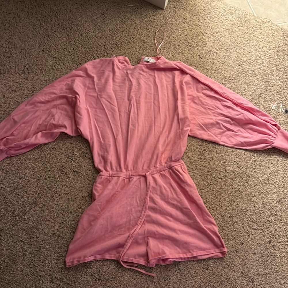 Pink Knit Romper
Size Large
Never Worn